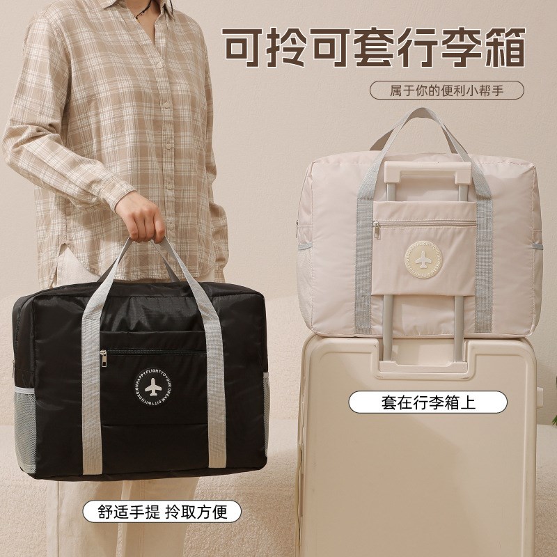 可套行李箱拉杆上的收p纳可挂行李箱收纳袋户包大容量装衣服收纳