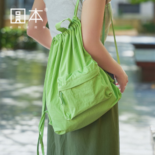 日系ins小众设计百搭尼龙抽绳束口双肩背包休闲轻便手提书包学生