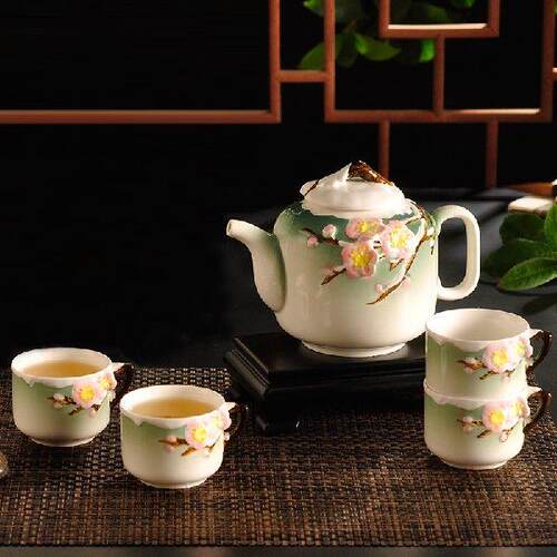 Chinese style plum chrysanthemum stereo ceramic tea set