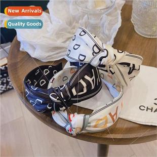 fabric satin knot whe vers wide wind letters black printing