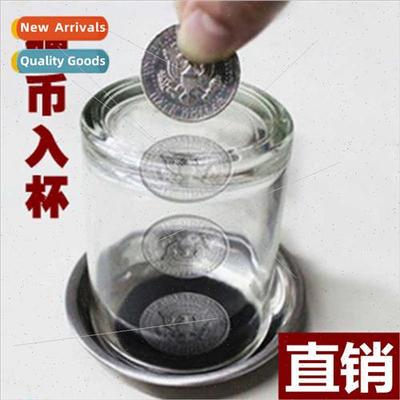 coin into cup coins through cup coasters close-up children m