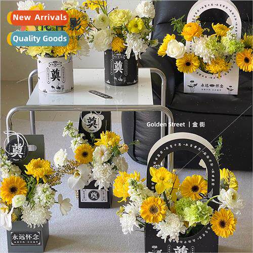 Chrysanthemum flower arrangement in black white flower box