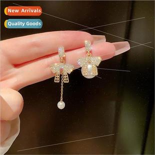 pearl asymmetric bow 925 long pin earrings silver