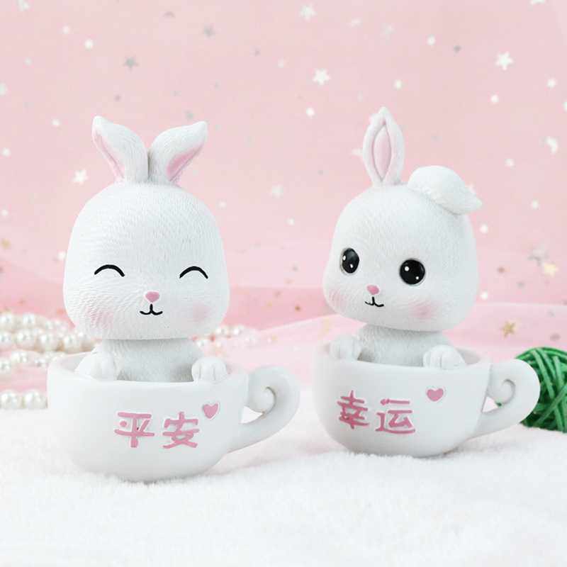 新款直销新款大眼萌兔可爱萌摇头汽车摆件卡通树脂车内中控台车载,家居饰品,桌面摆件,淘宝优惠券,粉丝福利购,淘宝优惠卷