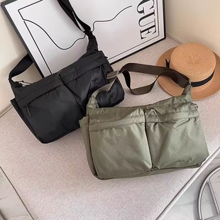 新款斜挎包单肩包多口袋轻便休闲大容量男女包包旅行防水包超轻薄