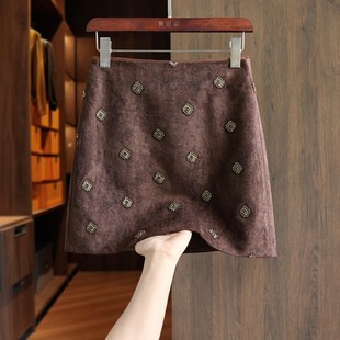 深圳南油轻奢高端货~洋气钉珠鹿皮绒a字裙女秋冬包臀短款半身裙