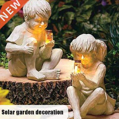 A Kid With Solar Fireflies Garden Statue Resin Jar Boy Girl