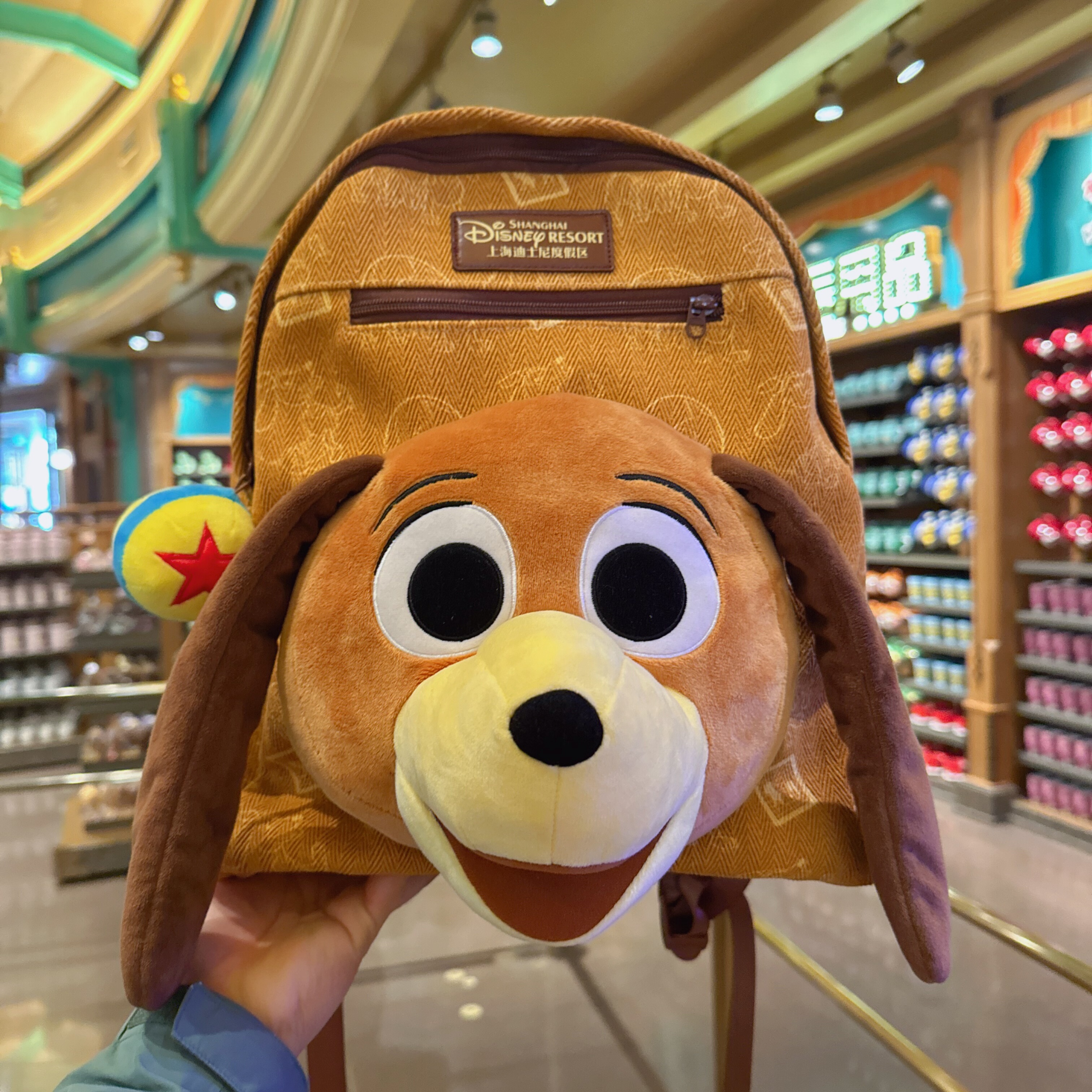 上海迪士尼乐园国内代购玩具总动员弹簧狗毛绒双肩包背包