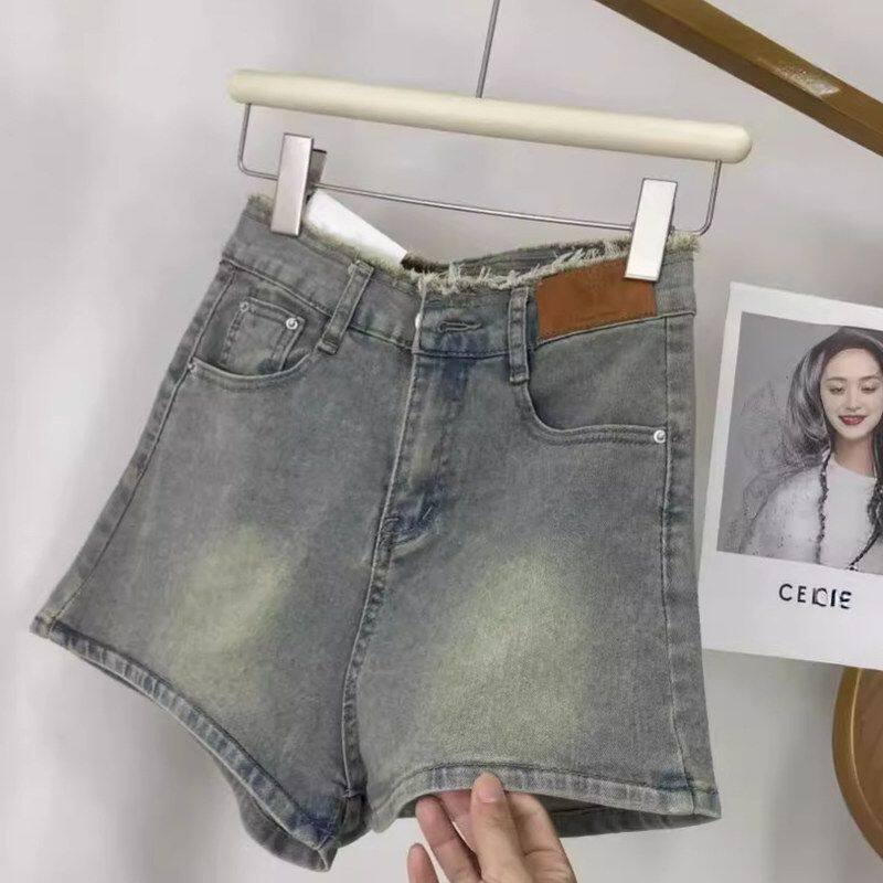 辣妹复古毛边牛仔短裤女2024年夏季新款高腰显瘦A字裤港风热裤子