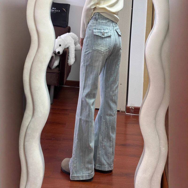 浅蓝色微喇叭牛仔裤女秋季新款高腰显瘦宽松不贴腿提花设计马蹄裤