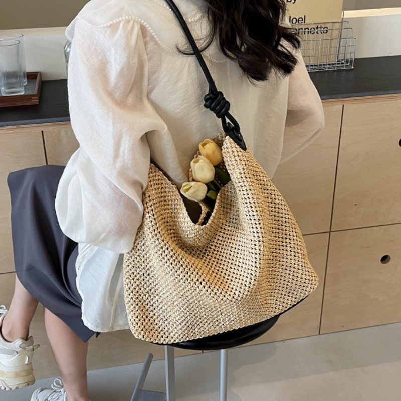 草编包包女2025新款度假沙滩包大容量镂空编织托特包慵懒风单肩包