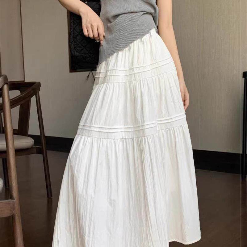 白色显瘦a字半身裙女夏2026春季新款蛋糕伞裙垂感法式气质长裙子