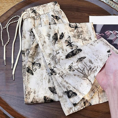 法式简约复古休闲冰丝阔腿裤女春夏宽松国风印花显瘦垂感直筒裤子