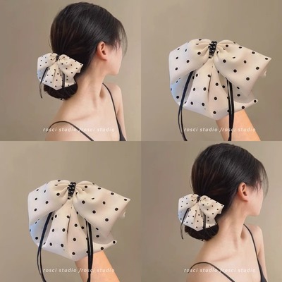 白色波点蝴蝶结飘带低丸子头抓夹