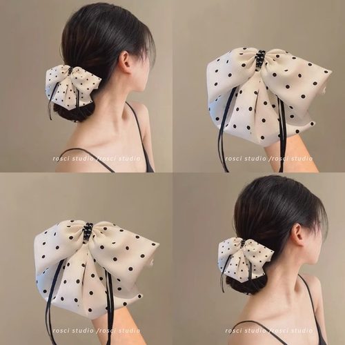 白色波点蝴蝶结飘带低丸子头抓夹