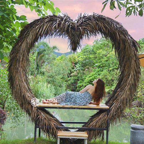 巴厘岛网红鸟巢民宿户外拍照秋千景区悬挂藤编吊椅心形鸟笼打卡款