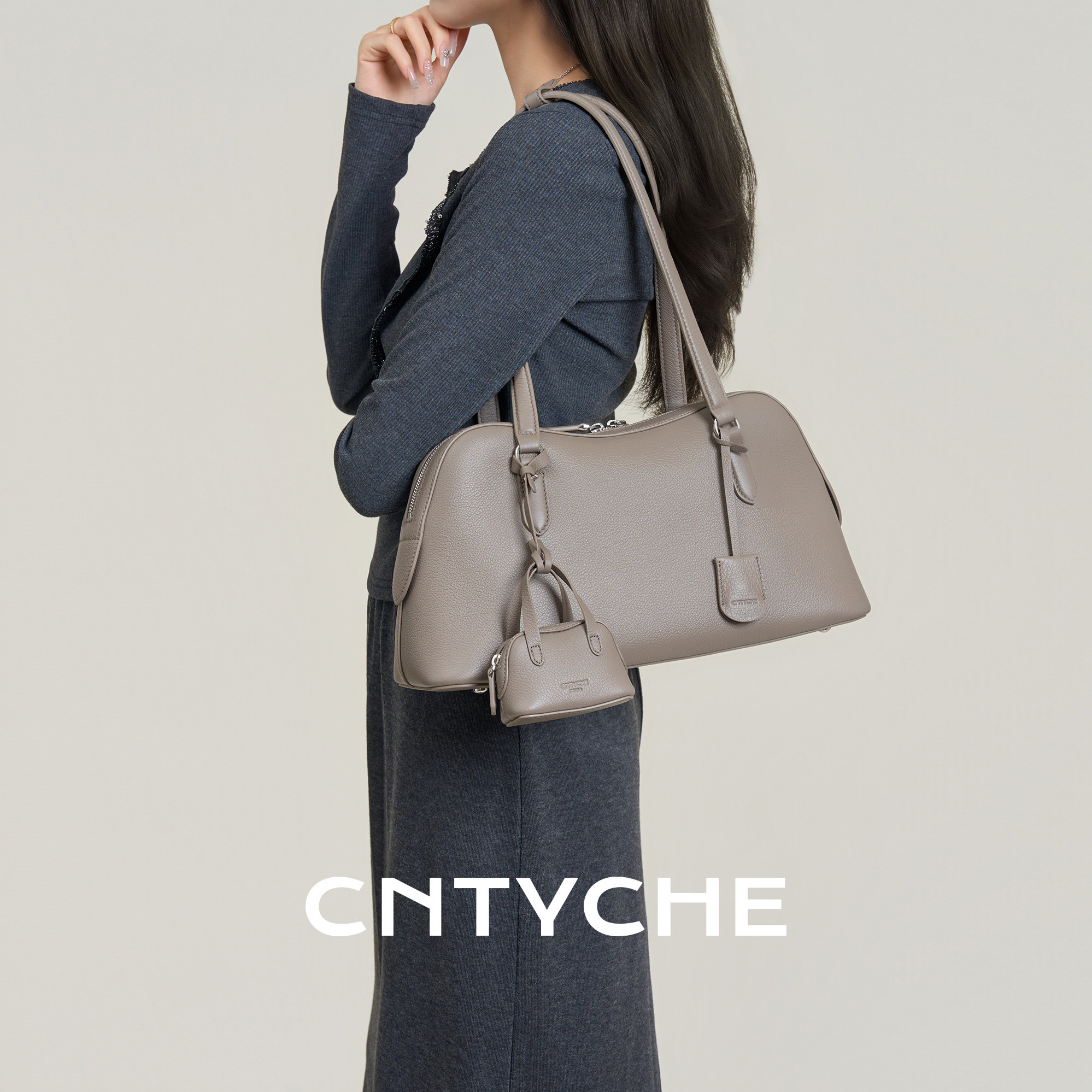 堤喀2026新款单肩托特包进口牛皮小众腋下波士顿包真皮保龄球女包,箱包皮具/热销女包/男包,托特包,淘宝优惠券,粉丝福利购,淘宝优惠卷