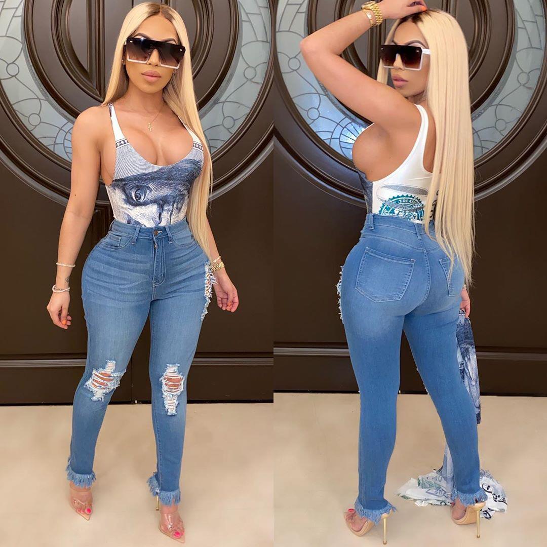Women's washed ripped stretch fringe jeans