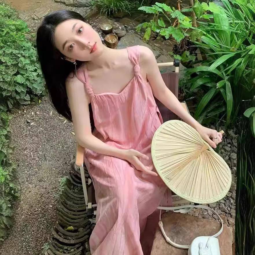 法式慵懒度假风气质晕染吊带连衣裙女夏季系带收腰粉色绝美长裙子