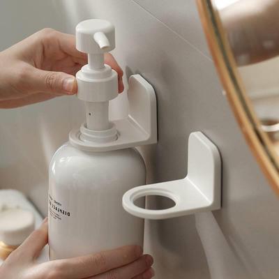 Pressed hand sanitizer shelf shampoo dispenser bottle holder
