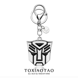 汽车人擎天柱威震天钛钢钥匙扣电影周边变形金刚标志书包挂件配饰