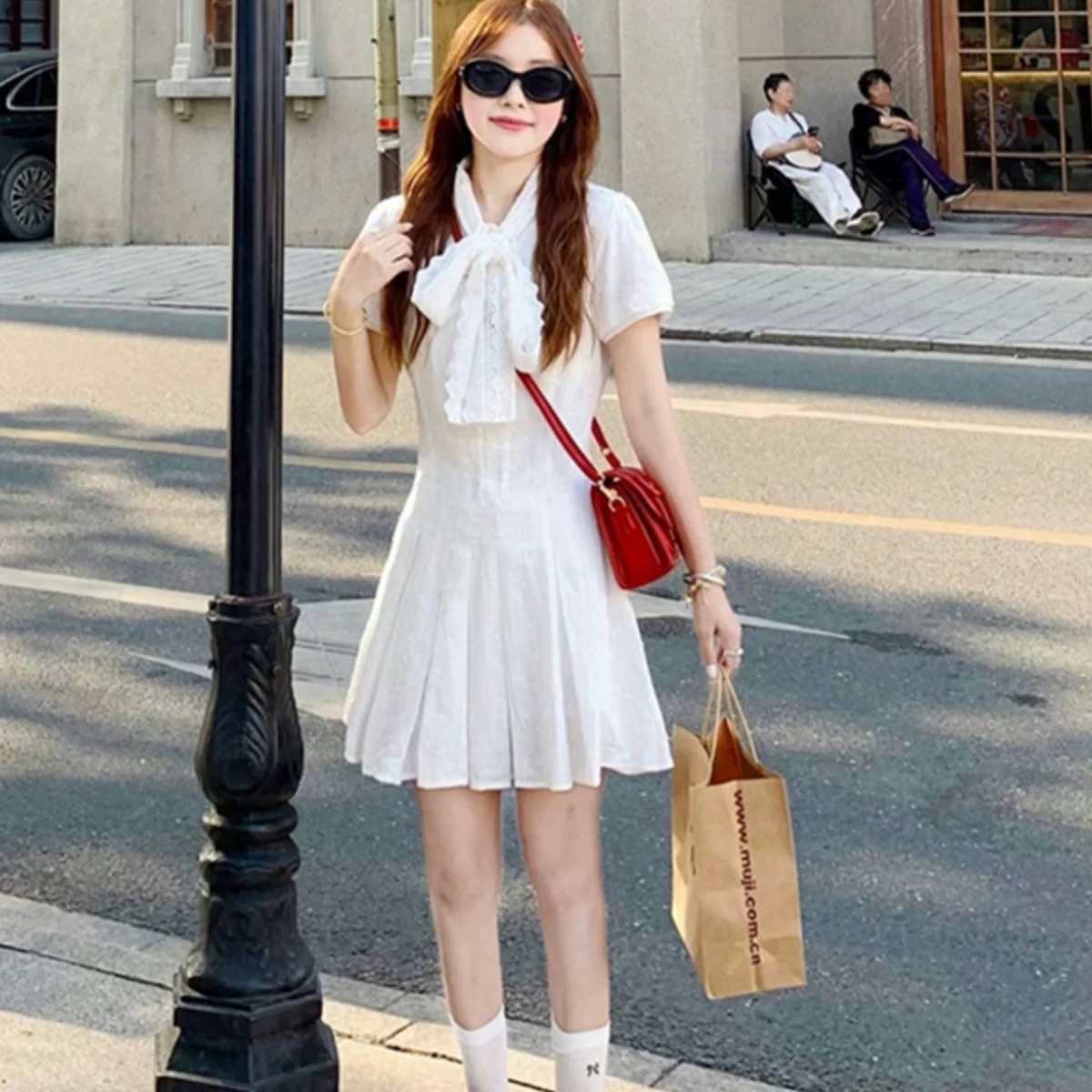 白色蝴蝶结简单大方的夏季连衣裙女2025新款小个子收腰短款小白裙