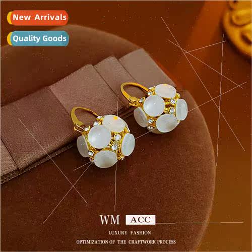 Electroplated cat eye stone round ball hollowed out earrings
