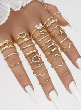 Love Wave28 piece set of gold joint rings