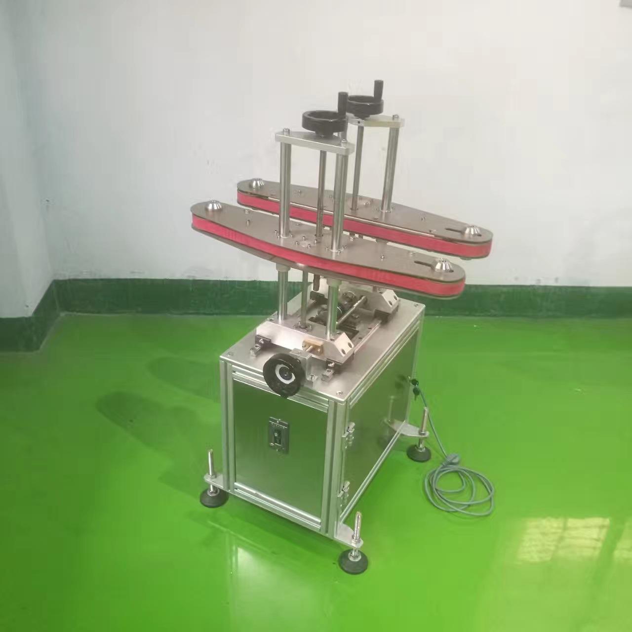 夹瓶过渡底部喷码双功能输送机