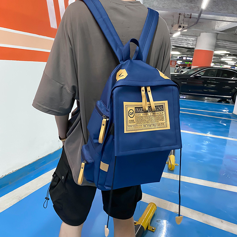 帆布双肩包大容量旅行电脑男士背包情侣学院风女高中大学生书包