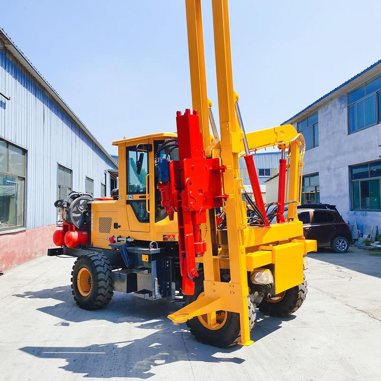 波形梁护栏立杆打桩机 打拔钻一体式小四轮 多用装载机护栏潜孔钻