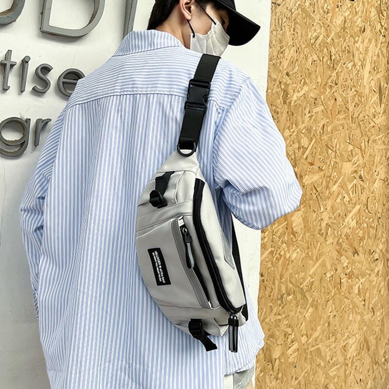 男士斜挎包男女2026新款男生运动骑行单肩胸包通勤旅行腰包小背包