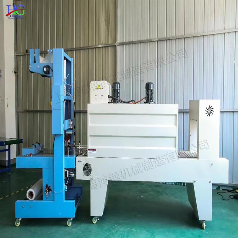 袖口式自动套膜机 矿泉水纸箱缠膜封切机 PE膜饮料直线气缸包装机