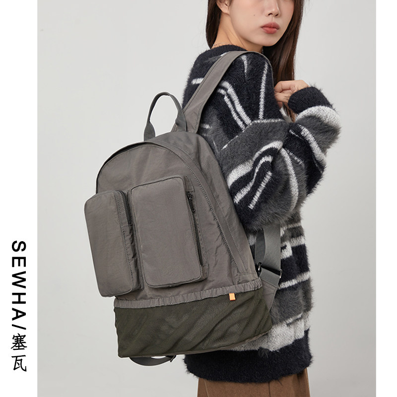 男女户外旅行双肩包2024新款轻便大容量电脑背包小众休闲学生书包