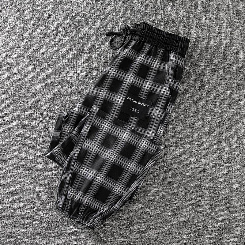 潮牌黑白格子束脚休闲裤女2025秋冬季新款宽松加绒显瘦格纹哈伦裤