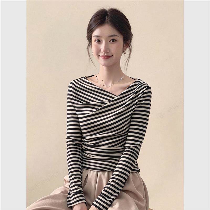SPYB黑白条纹不对称上衣女2026春季新款气质百搭时尚独特显瘦小衫