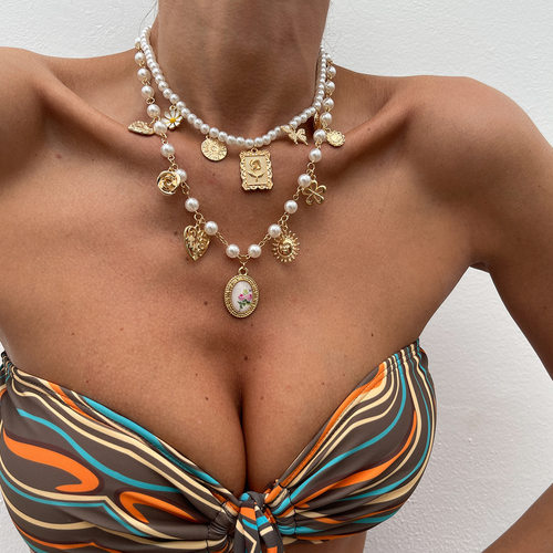 2件套复古珍珠花朵爱心太阳项链