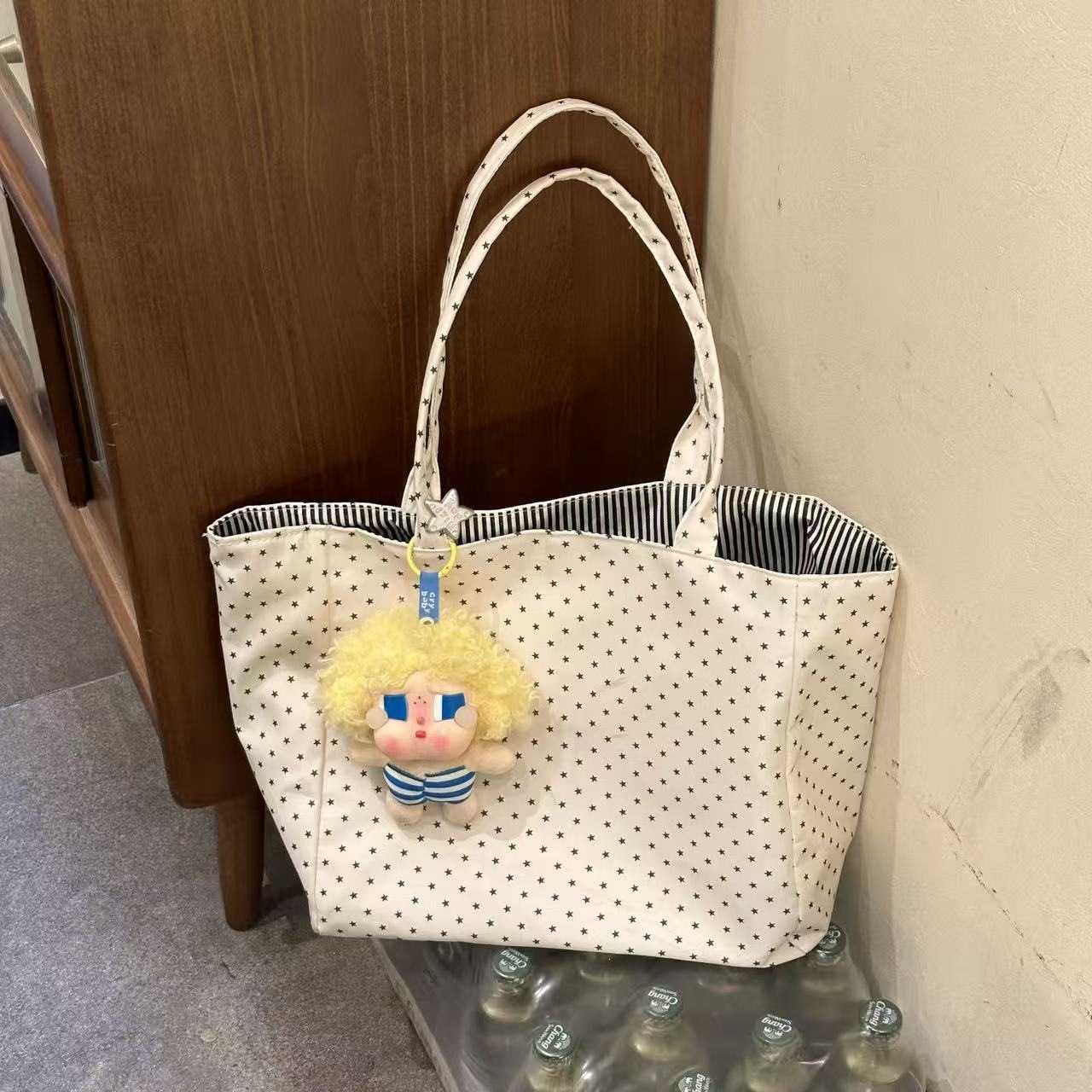 慵懒风黑白条纹双面印花帆布包女