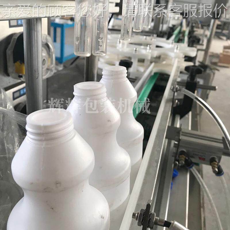 自灌动精漂白水体HH-2灌装线酒 腐蚀液灌装生产线 装旋盖一体