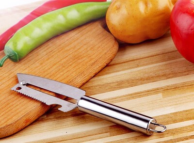 Multi functional household stainless steel fruit peeler and fruit planing knife for peeling fruits and melons