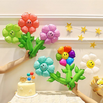Sunflower balloon holding aluminum film smiling face birthday scene decoration, setting up stalls, pushing children's f