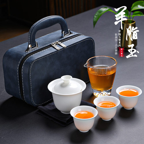 Sheep fat jade white porcelain covered bowl portable travel tea set, one pot, three cups ceramic kung fu tea set, busin