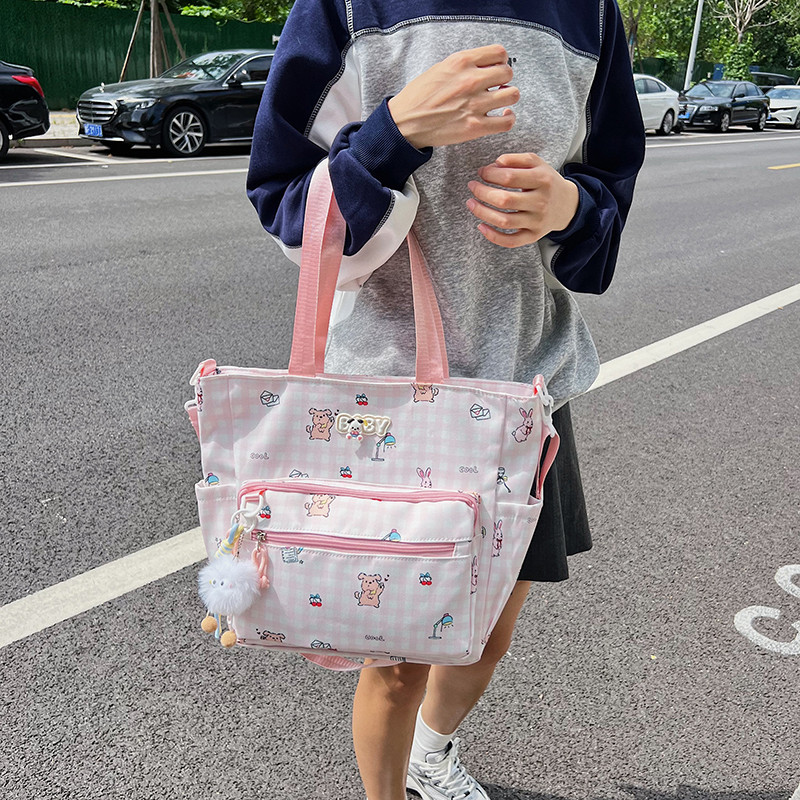 可爱卡通印花大容量单肩包挂书袋