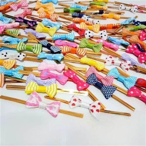 面包包装粉红色的棒棒糖蝴蝶结手烤新金领带线密封绳