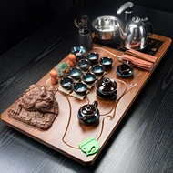 Một bộ hoàn chỉnh pha trà kung fu Bộ trà cóc vàng ba chiều Trung Quốc Bộ khay trà ấm đun nước hoàn toàn tự động bốn trong một bàn trà điện bàn trà điện