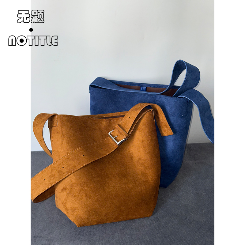 蓝棕色水桶包大容量单肩斜挎腋下