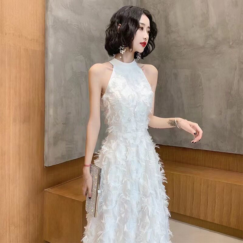 高贵白色挂脖晚礼服主持名媛2025新款轻奢高级感鱼尾修身年会长裙