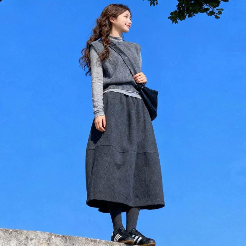 毛呢黑色半身裙短裙女秋冬季2026新款a字伞裙小个子五分花苞半裙