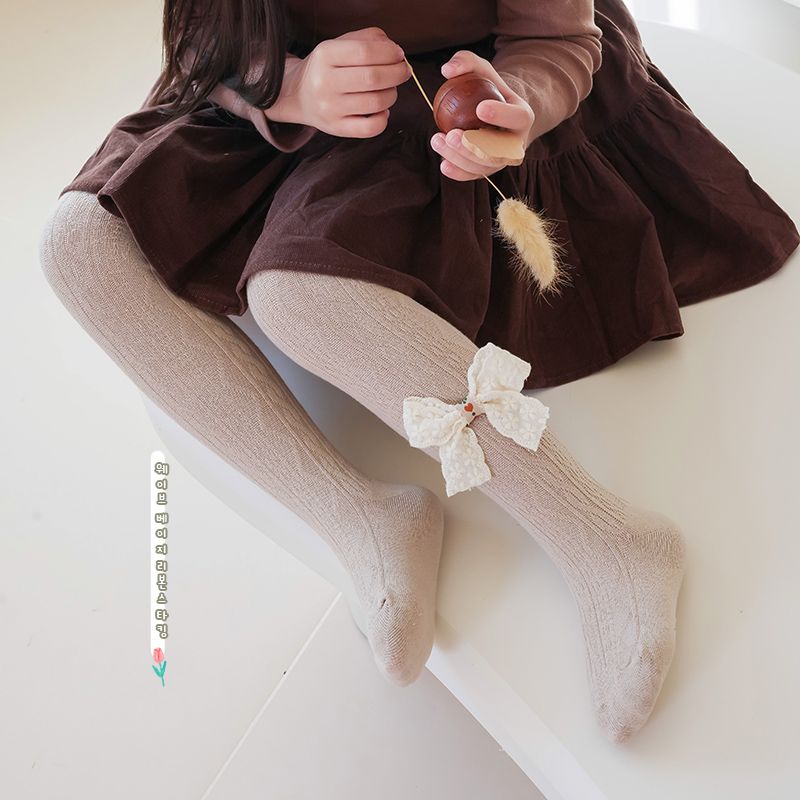 治愈系米花蝴蝶结女孩春
