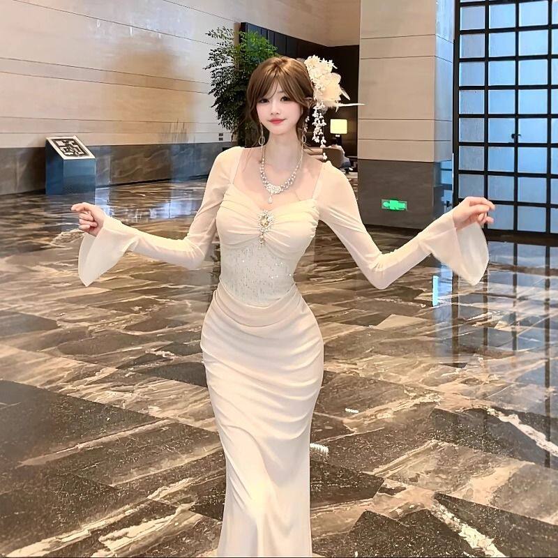 法式设计感拼接亮片褶皱喇叭袖连衣裙女春季性感纯欲收腰包臀长裙